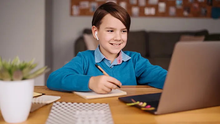 Child completing an online assessment